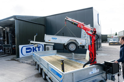 Dale Kane flatbed trailer fitted with crane lifting trailer