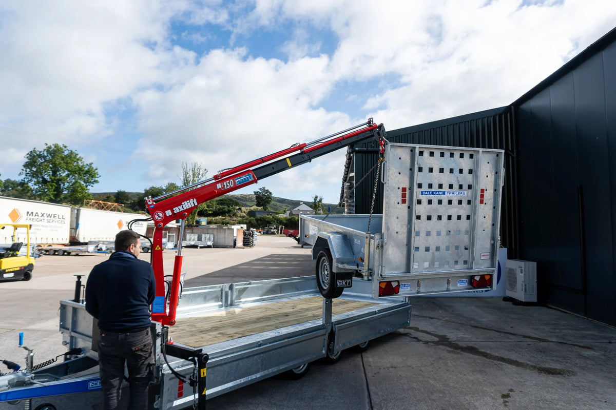 Dale Kane flatbed trailer fitted with crane lifting trailer