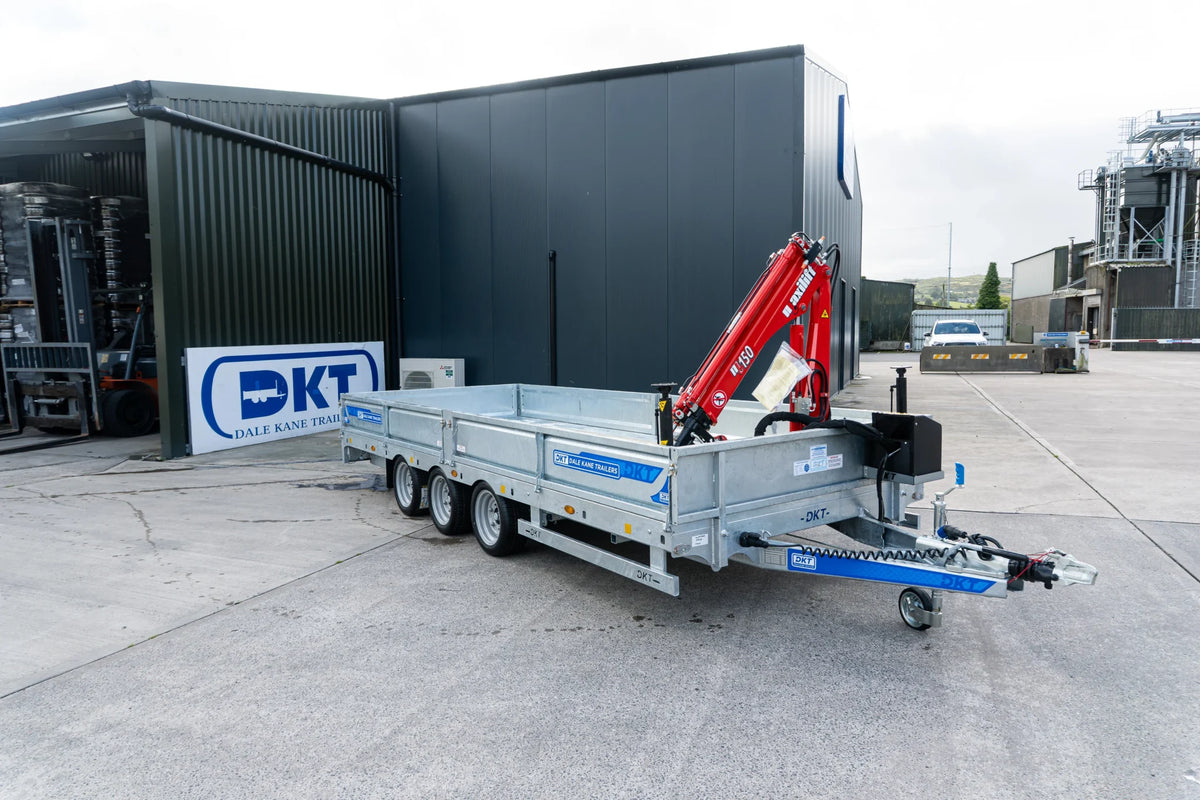 Dale Kane flatbed trailer fitted with a red crane at Cooley Agri Sales